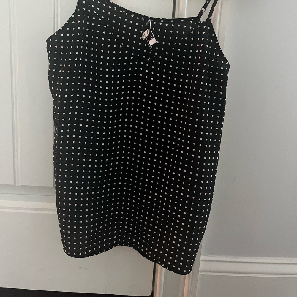 Black silk Camisole with white polkadots by Equipment.